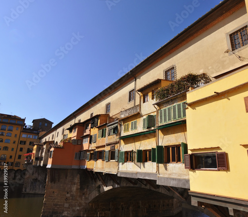 side view of famous Ponte Vecchio in Florence, Tuscany © eddygaleotti