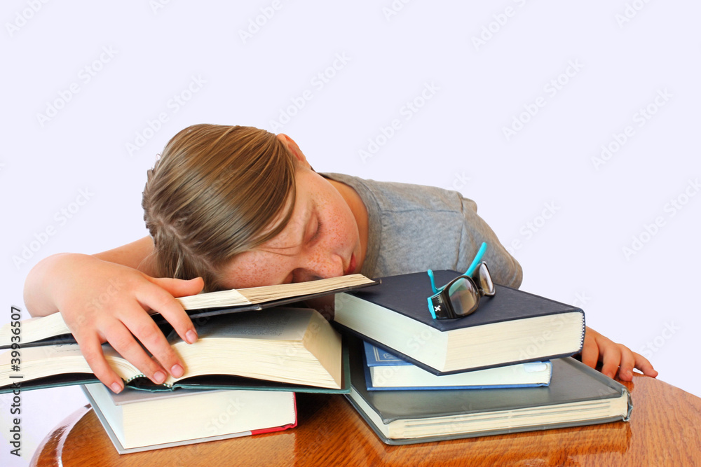 Young Girl With Freckles Sleeping On Books Young Girl With Freckles Sleeping On Books