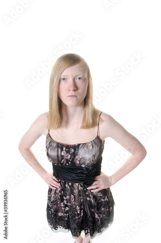 Blond teen looking angry photo