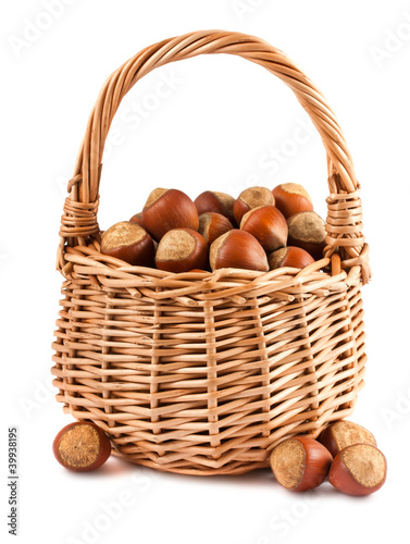 Wicker basket with hazelnuts