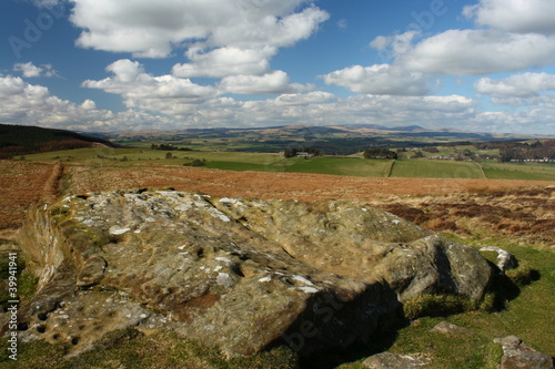 cup and ring marked rock at Simonside Hills photo