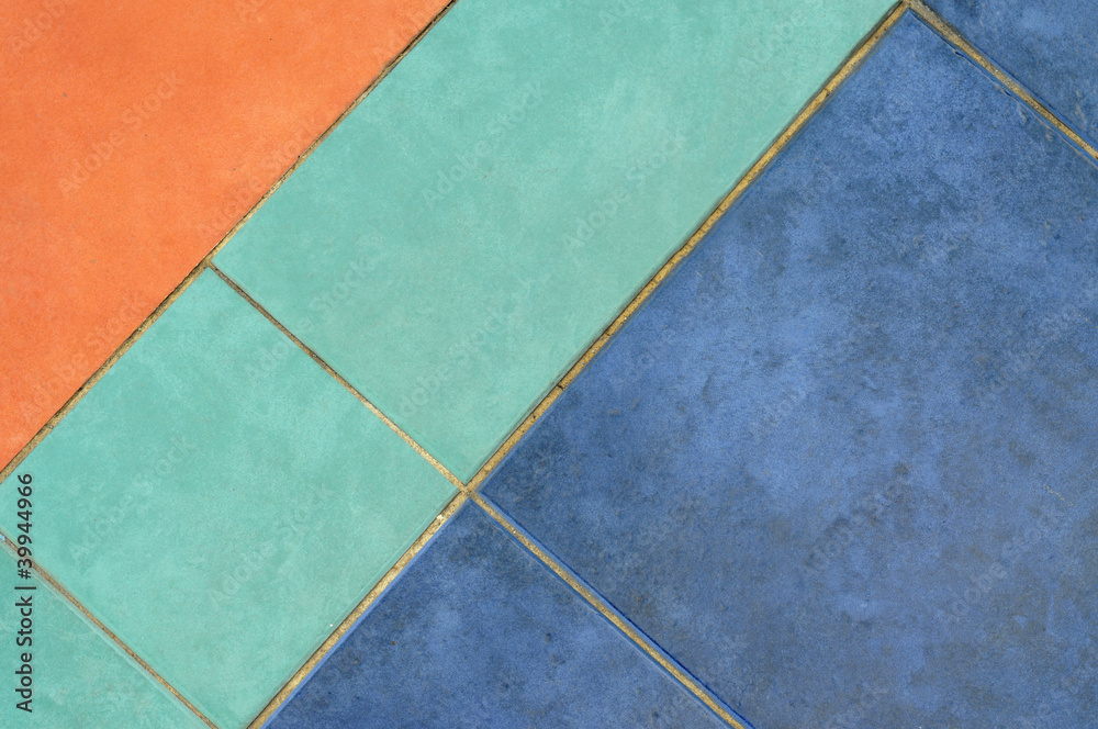 Fototapeta premium Pavement pattern in orange, blue and green