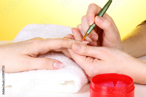 Manicure process in salon