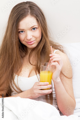 Beautiful lady drinking fresh juice