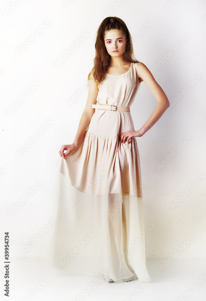 Fashion beautiful brunette woman in trendy silk evening dress Fashion beautiful brunette woman in trendy silk evening dress