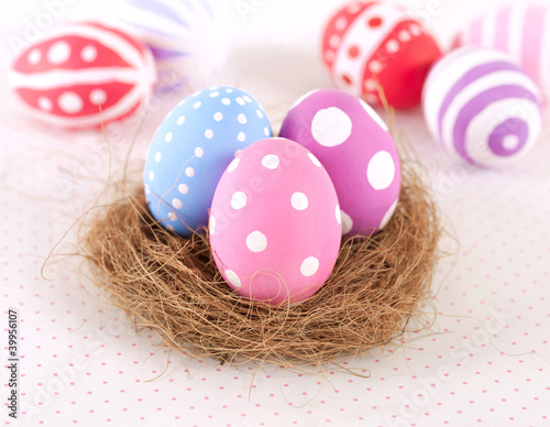 Painted Colorful Easter Eggs in nest.