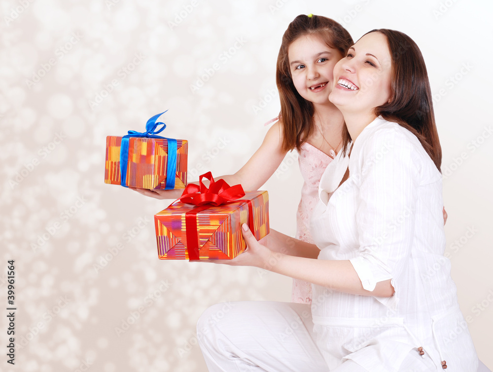 Mother and daughter with presents Mother and daughter with presents