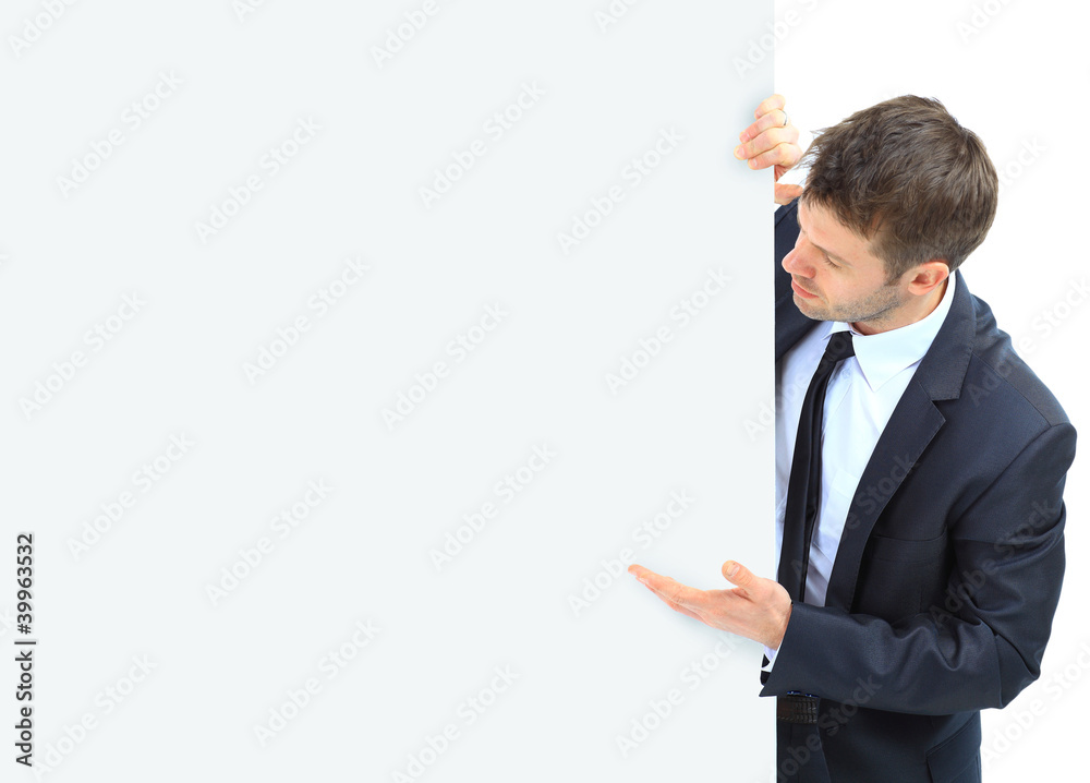 Happy smiling business man showing blank Happy smiling business man showing blank