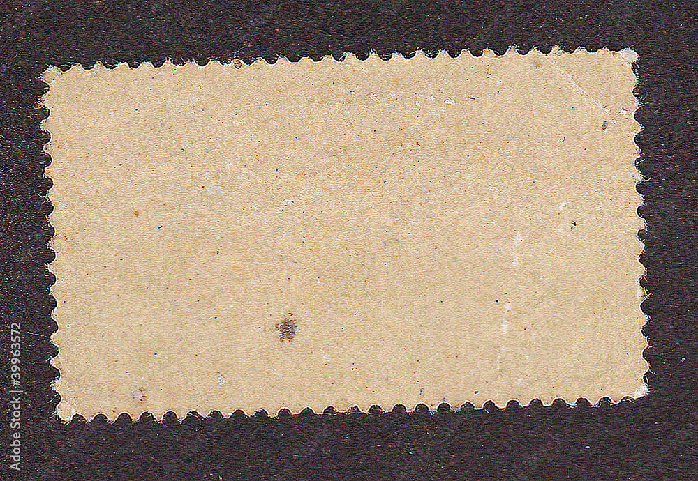 Fototapeta premium Old postage stamp border on black