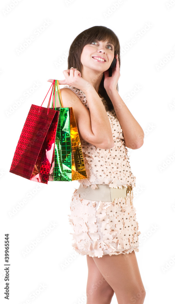 Happy young woman with shopping bags