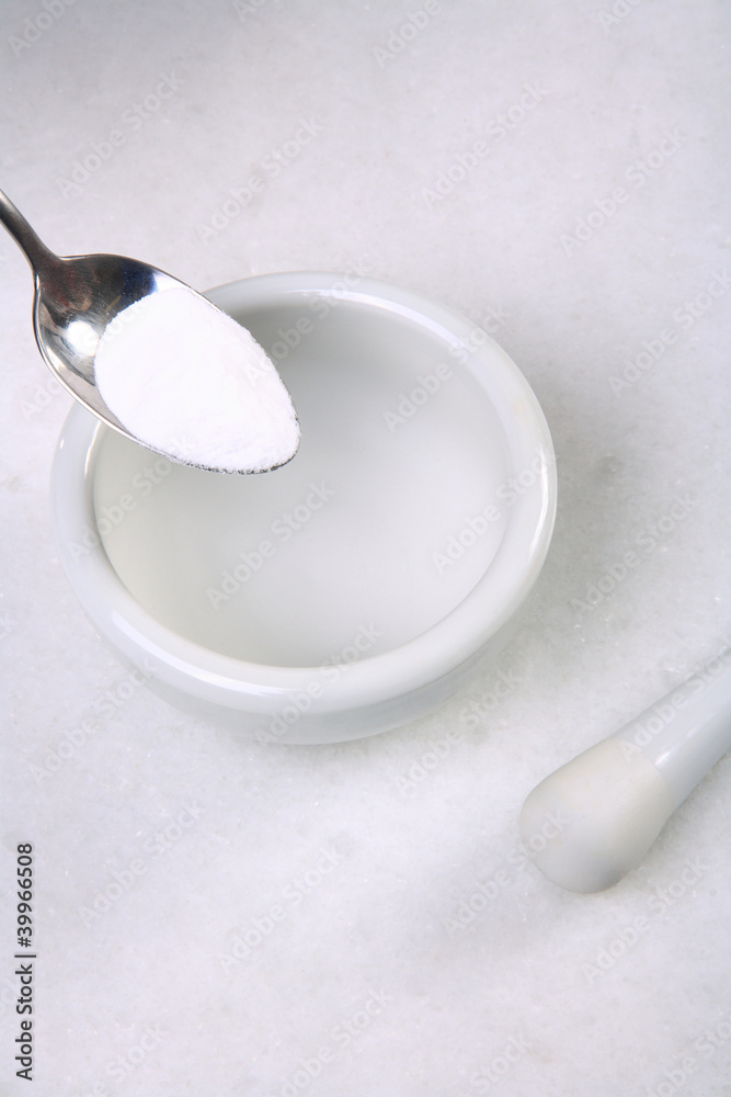 mortar with spoon and powder mortar with spoon and powder