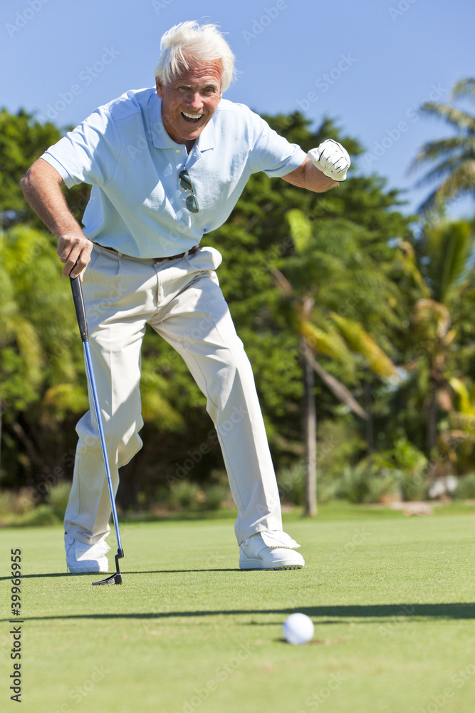Obraz premium Happy Senior Man Putting Playing Golf