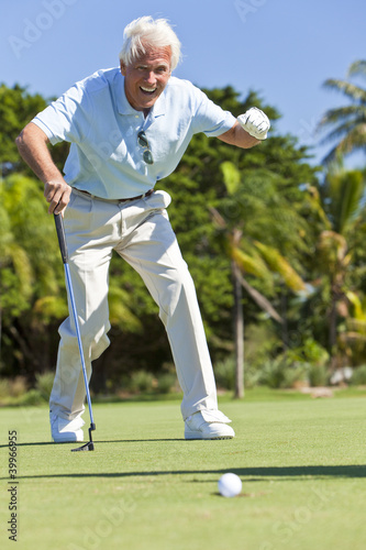 Happy Senior Man Putting Playing Golf photo