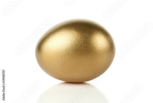 Gold egg isolated on white background