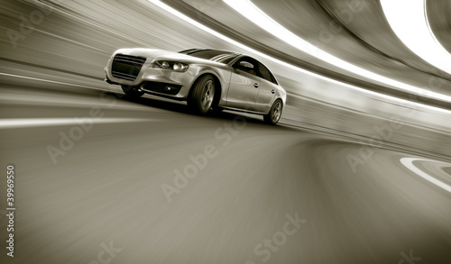 Car driving fast in tunnel © zentilia