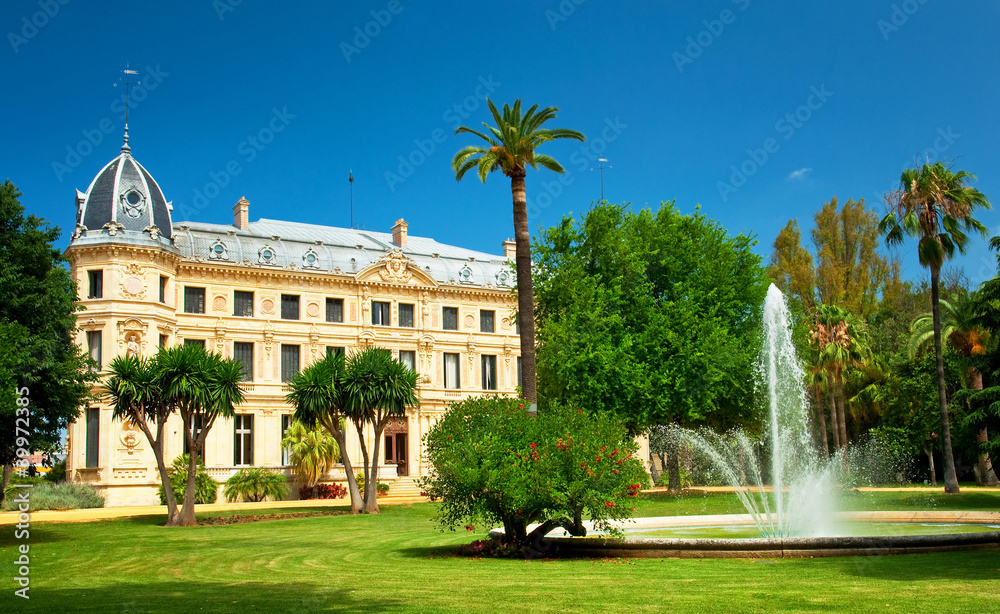 Nice house with fountain and trees
