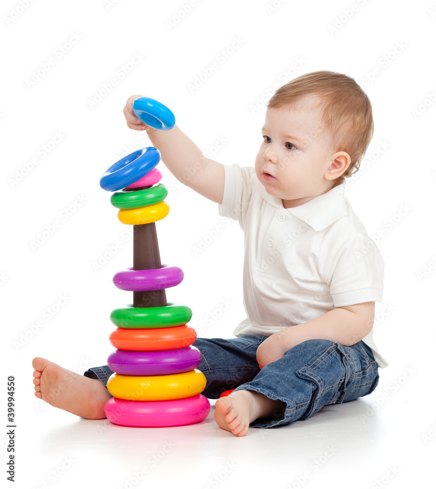 child playing with color pyramidion child playing with color pyramidion