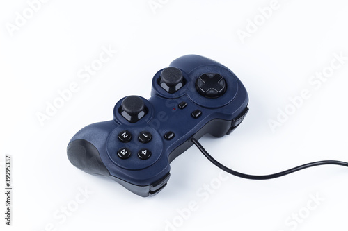 Old joystick is used for gaming on a white background