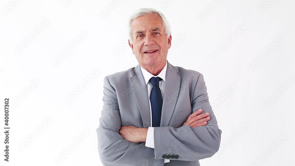 Mature man crossing his arms Mature man crossing his arms