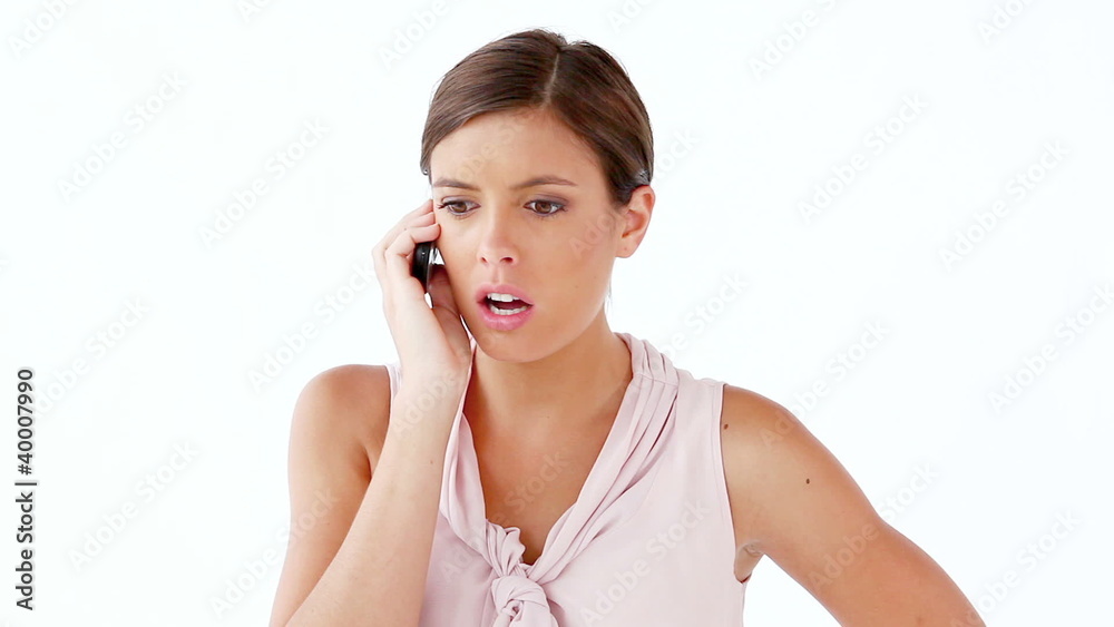 Serious woman using a mobile phone Serious woman using a mobile phone