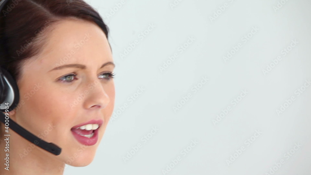 Woman using a headset Woman using a headset