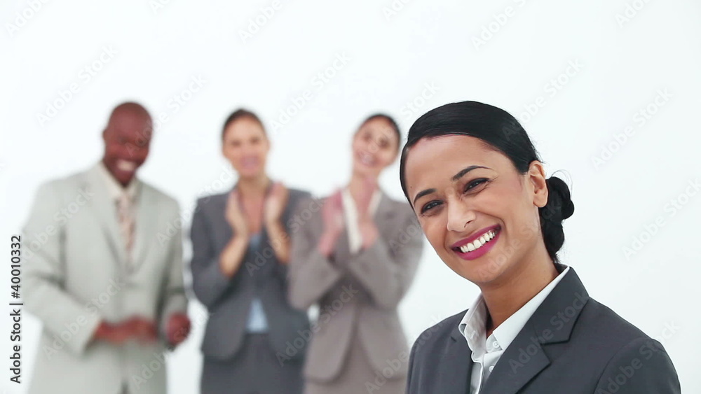 Businesswoman being congratulated Businesswoman being congratulated