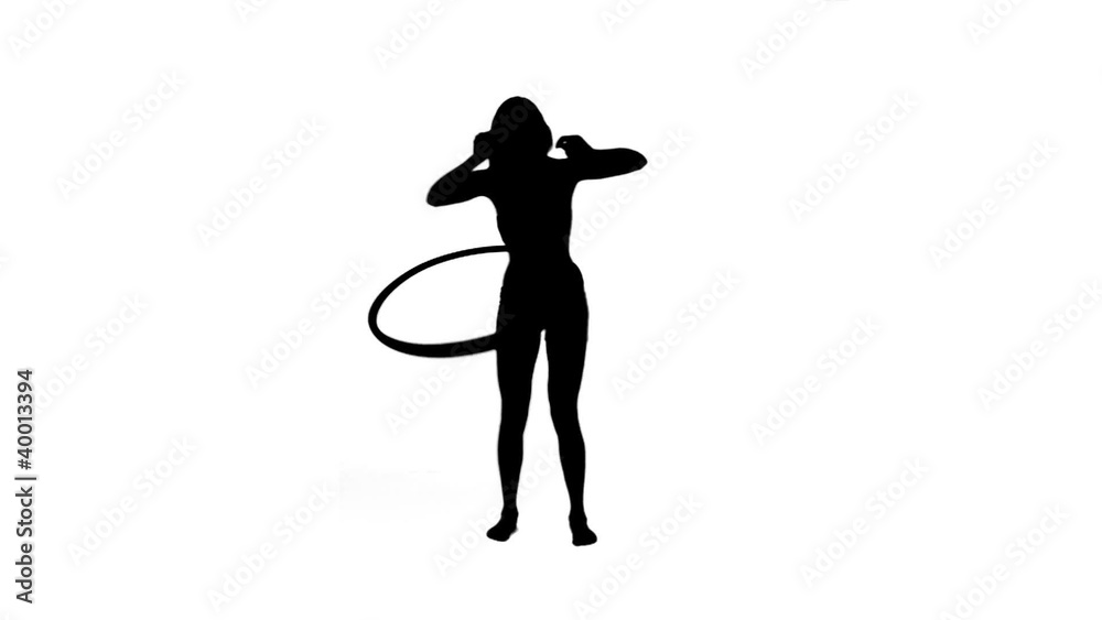 Silhouette of a woman with a hula hoop Silhouette of a woman with a hula hoop