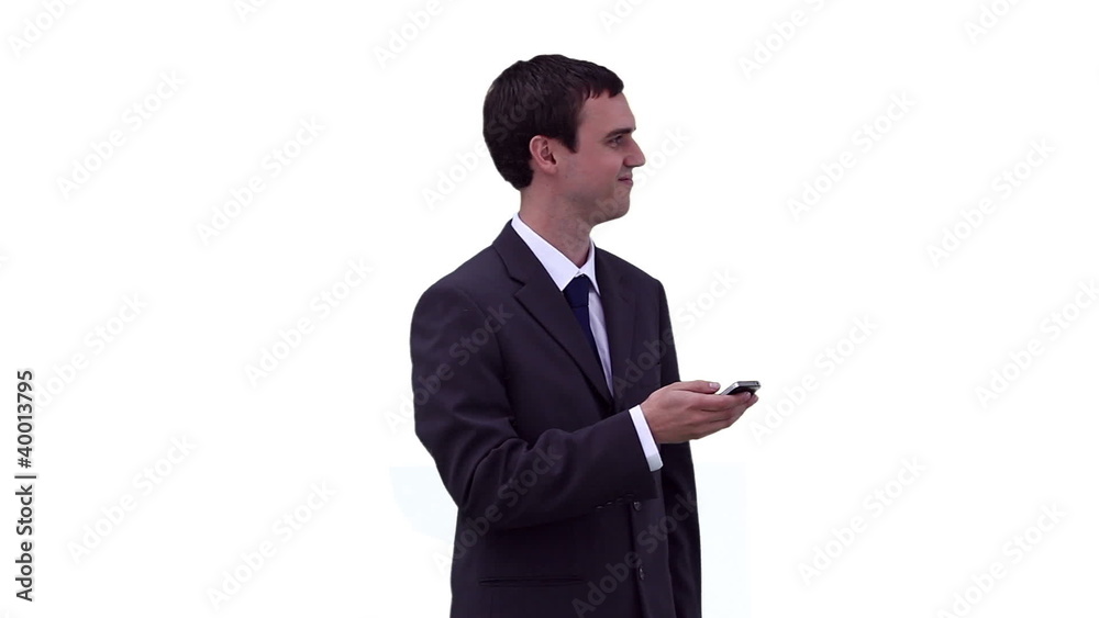 Businessman reading a text message before looking away Businessman reading a text message before looking away