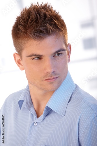 Handsome young man posing photo