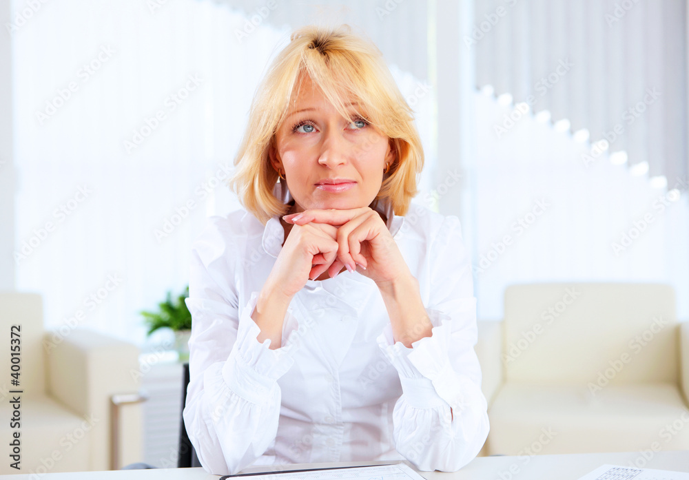 Young beautiful woman in business wear at work Young beautiful woman in business wear at work