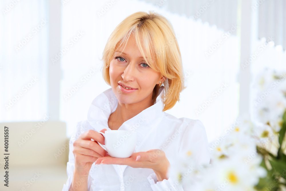 Young beautiful woman in business wear at work Young beautiful woman in business wear at work