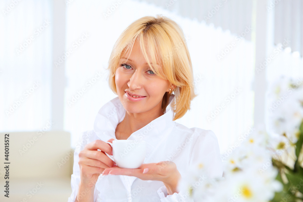 Young beautiful woman in business wear at work Young beautiful woman in business wear at work
