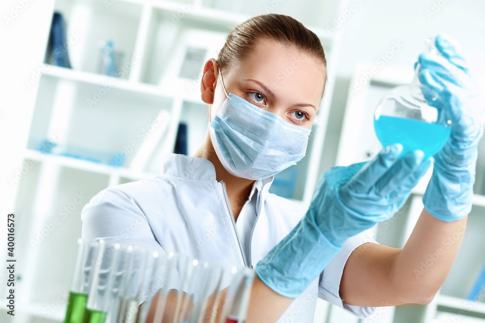Young scientist working in laboratory Young scientist working in laboratory