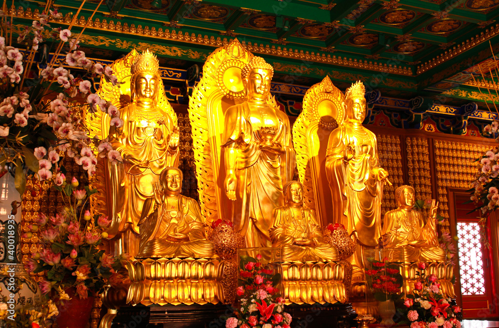 Golden buddha statue in Chinese temple in Thailand