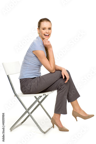 Attractive woman sitting on chair