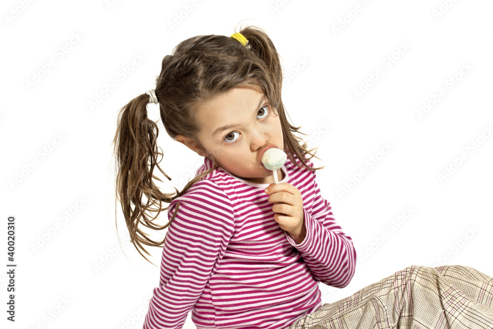 Close-up of adorable little girl with a lollipop Close-up of adorable little girl with a lollipop