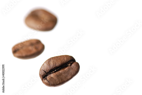 Three Coffee Beans on White Background.