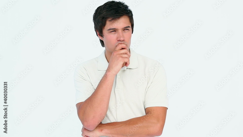 Man posing with a hand on his chin Man posing with a hand on his chin