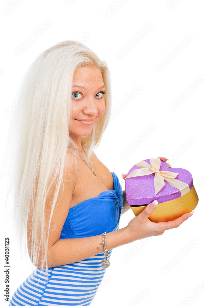 Beautiful sexy blond woman in blue dress with heart present box Beautiful sexy blond woman in blue dress with heart present box