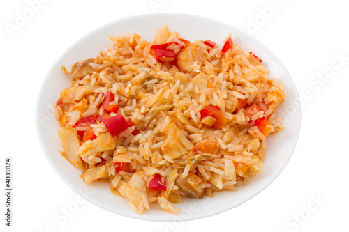 rice with codfish and vegetables on the plate
