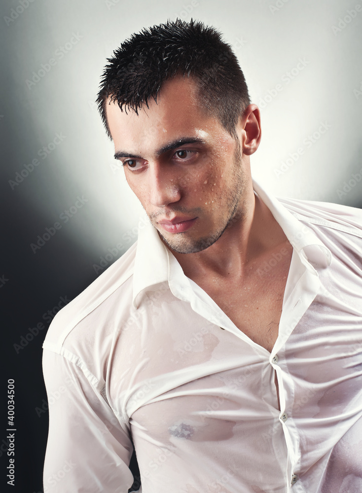 Soak wet young handsome men, studio shot Soak wet young handsome men, studio shot