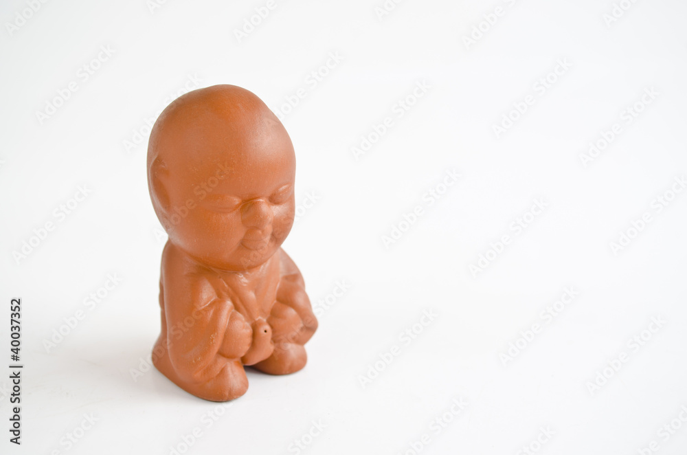 baked clay doll isolate on white background baked clay doll isolate on white background