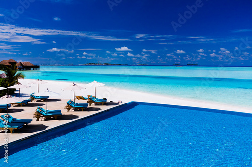 Deck and infinity pool over tropical lagoon