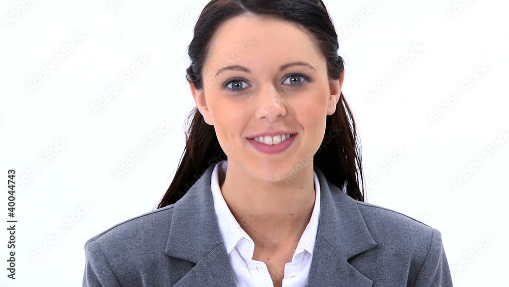 Brunette woman looking at the camera is speaking Brunette woman looking at the camera is speaking