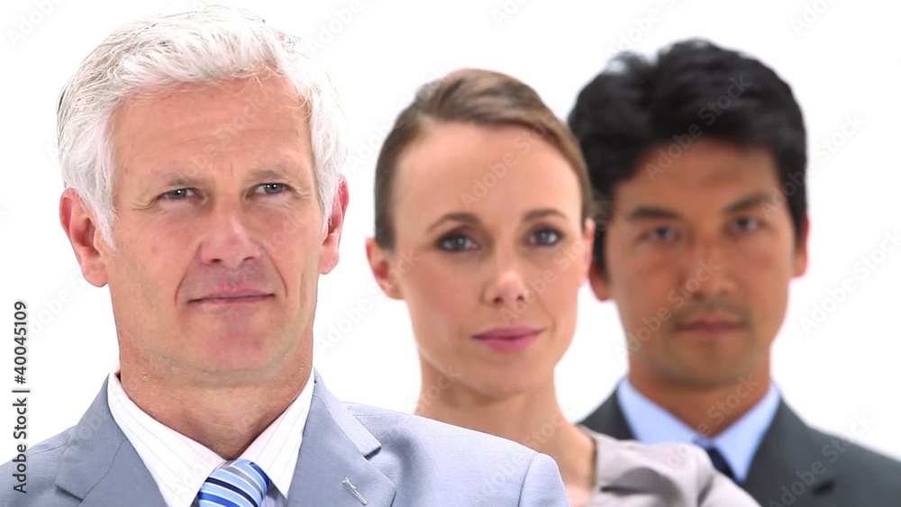 Three business people in a line Three business people in a line