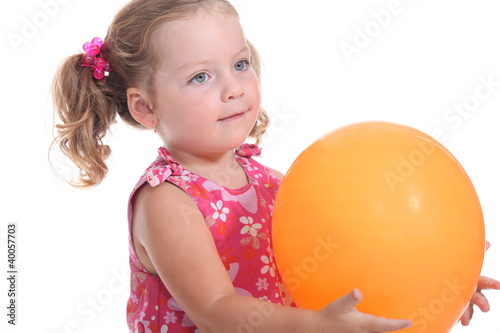 girl holding a balloon