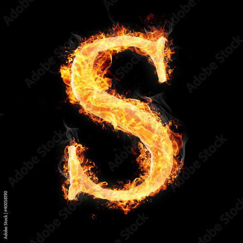 Fonts and symbols in fire on black background - S