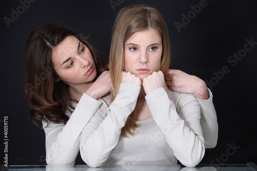 Canvas Print Sisters having an argument