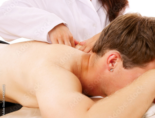 Young smart male enjoying massage