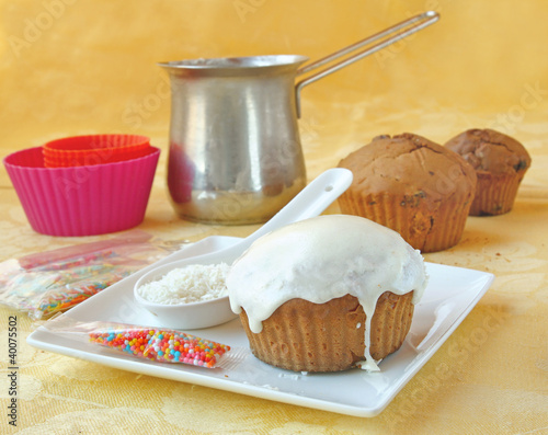 Decoration cupcake cream and coconut shaving photo